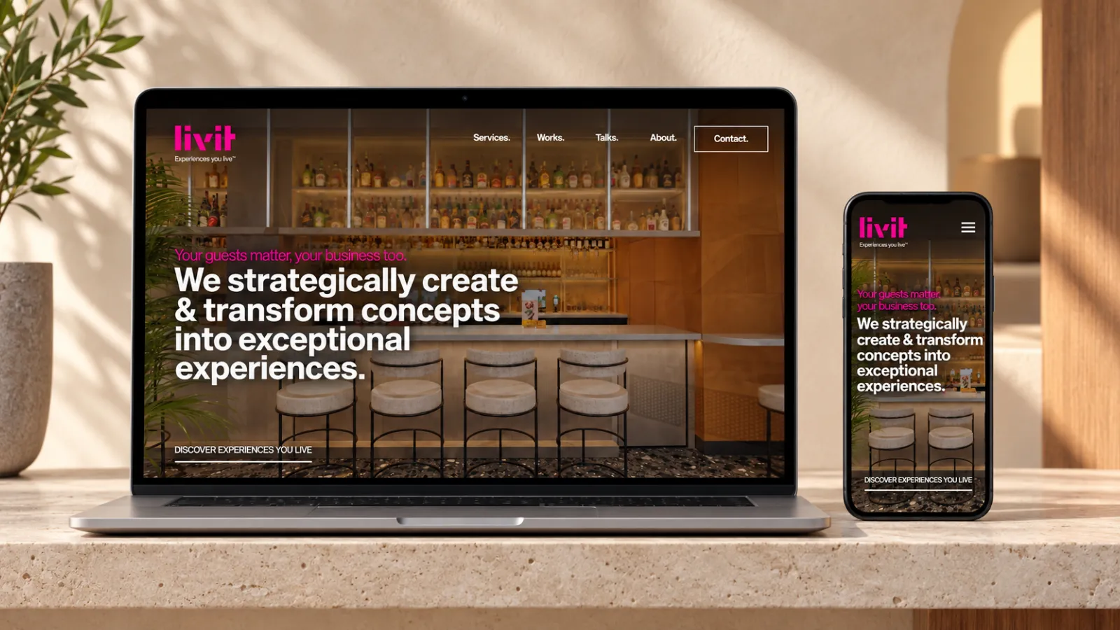 Livit website displayed on a laptop and phone.